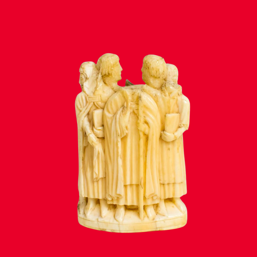 Four intricately carved ivory figures stand in a circular formation, holding scrolls, against a bold red background, conveying historical elegance.